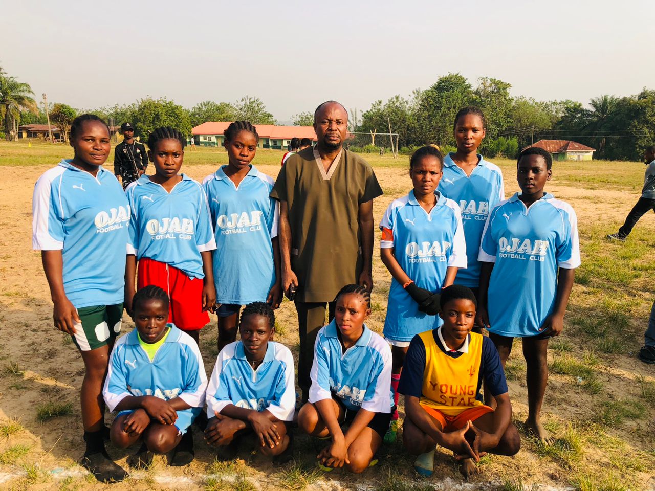 Ojah Babes, runners up in the female category pose for photograph with the Chairman.